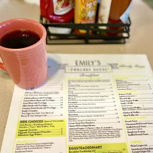 a cup of coffee and menu