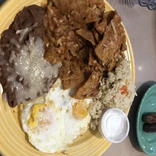 Chilaquiles 3eggs rice and refried beans