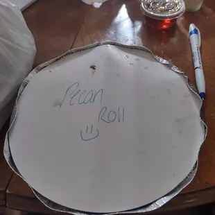 a piece of tin foil with a message written on it