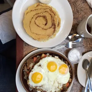 Greek sizzling smiley(skillet...it auto corrected but this works too) with cinnamon swirl pancakes.