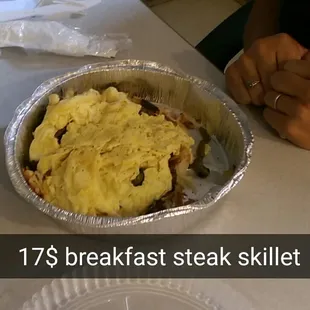 $17 steak skillet with 5 bites of steak. No seasoning.