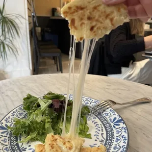 Arepa Con Queso cheese pull