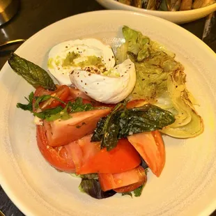 Burrata, roasted heirloom tomatoes, charbroiled iceberg lettuce