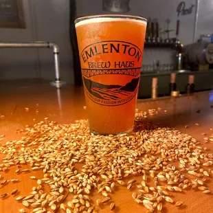 a pint of beer on a table