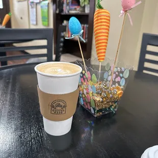 a cup of coffee on a table