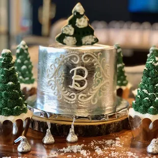 a cake decorated with christmas trees
