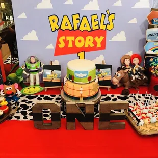 Her cute desserts (cake, cookies, cake pops) in action on the dessert table for my son's Toy Story theme birthday