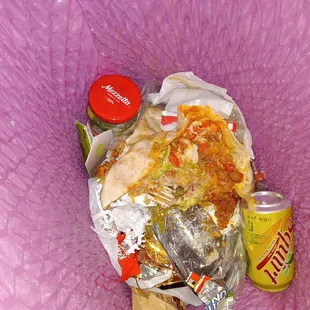 Nowhere on their website or menu does it mention lettuce and tomatoes included inside the burrito so I threw mine in the trash