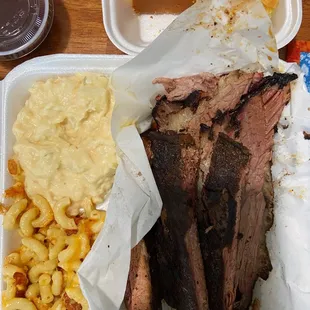 2 way combo dinner: pork ribs, brisket, Mac and cheese, and potato salad