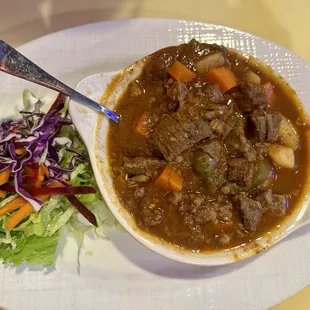 Carne Guisada plate with rice &amp; beans.