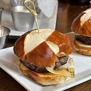 two burgers on a plate
