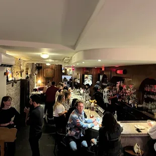 people sitting at a bar