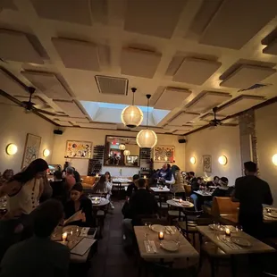 a restaurant with a skylight