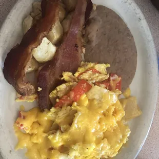 Migas, beans, potatoes, with an order of bacon! World Class!