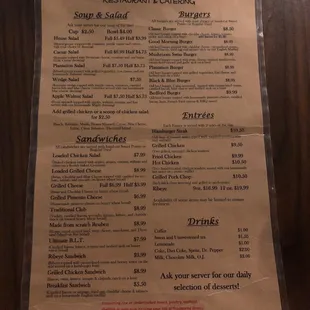 a menu on a wooden table