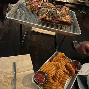 Sausage, green peppers, red onions, and cheese.