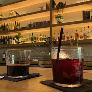 Red wine and sangria is served in a cocktail glass