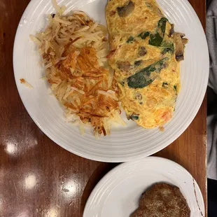 Omelet and a side of sausage patties