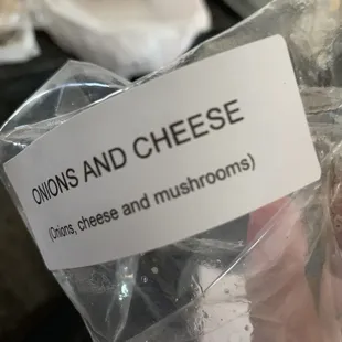 a person holding a bag of food