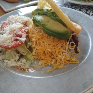 Arepas Llanera (skirt steak, cheese, and avocado)