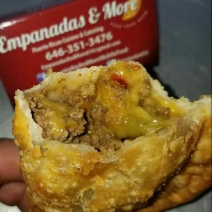 Here&apos;s one of our top 3 sellers. The cheeseburger empanada (carne y queso). Try it with or without our delicious sauces.