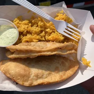 Mexican Chorizo and Ground Beef Empanadas. Over $20 with tip. Ran out of sauce after eating one.
