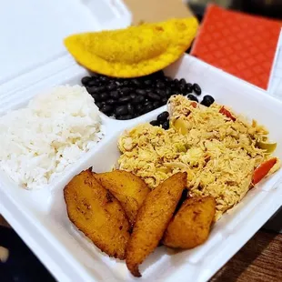 Shredded Chicken Pabellón with a beef empanada