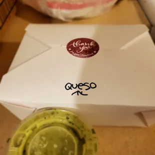 a box of queso next to it