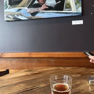 The last of some Weihenstephaner and some of the local art for sale on the wall