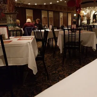 dining area with tables and chairs