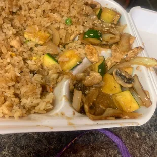 rice and vegetables in a styrofoam container