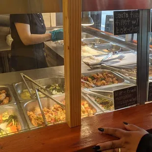 a woman ordering food