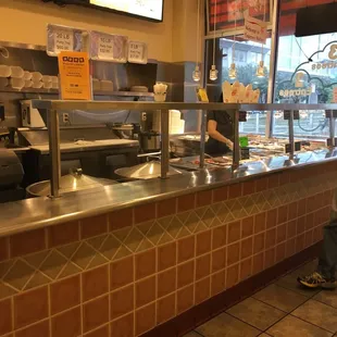 Serving line for lunch. Fresh food brought out prettier regularly.