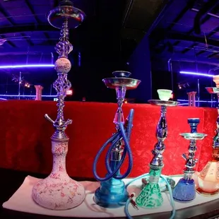 a variety of glass vases on a table