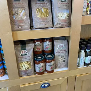a shelf full of baked goods