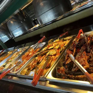 a variety of trays of food