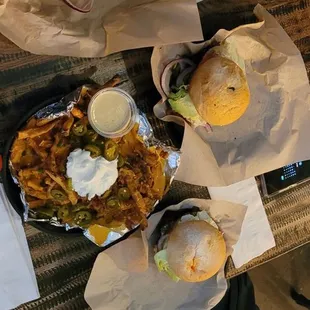 a man sitting at a table with food