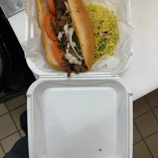 Philly steak with rice. I added extra tomatoes.