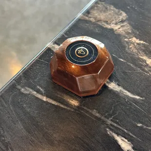 They have a bell at each table now