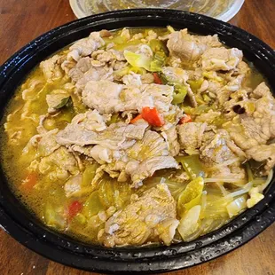 Beef in golden soup. 2nd time ordering.  Spicy savory sour. Very good