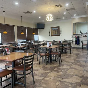 dining area with tables and chairs