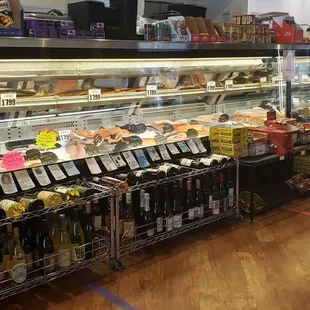a man standing in front of a display case