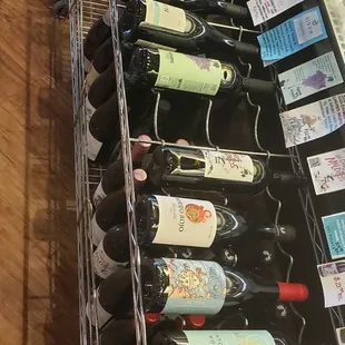 a rack of bottles of wine