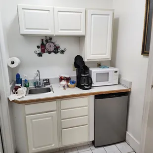 Kitchenette. Door to bathroom is on the left.