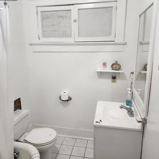 Bathroom. Tub on left.