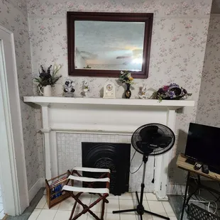 Non-working fireplace of our room.