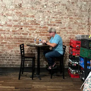 A man enjoying his pizza!!!!