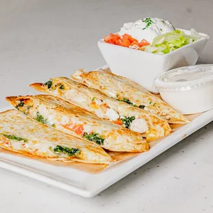 a plate of quesadillas