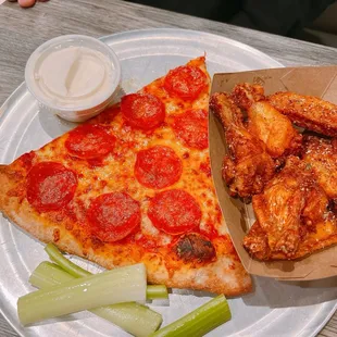 Highly recommended. Excellent pizza and wings. Slice and 6 wings lunch special is $10.  We will be back.