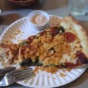 Slice of ghostface killah. Pepperoni, poblano peppers, BBQ potato chips and ghost pepper marinara.